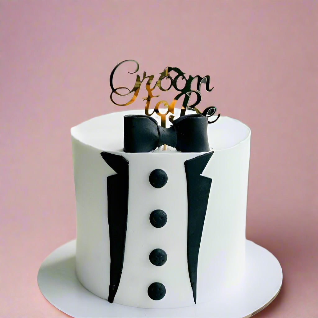 “Suit Up! Cake” with groom-inspired design for bridal event