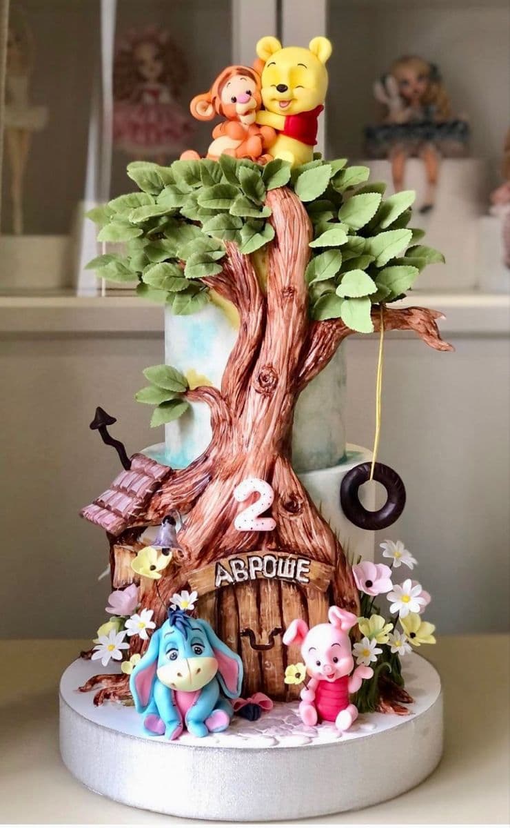 Three-tier cupcake tower with chocolate truffle and brand-coloured ribbon, made in Hyderabad for a corporate launch in March 2026.