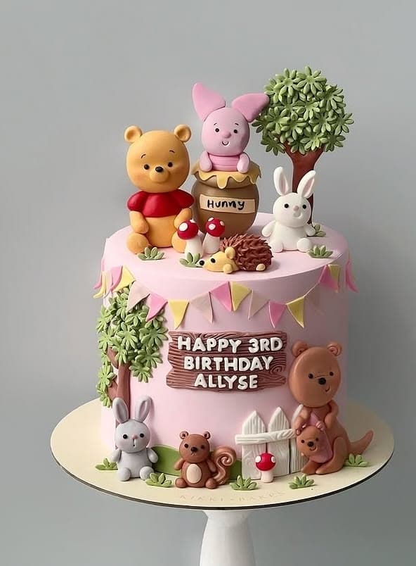 Two-tier rose pistachio buttercream cake with dried petals, made in Chennai.