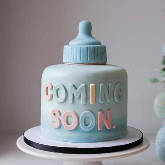 “Baby Joy Cake” in bright pastels with smiling baby face