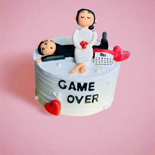 “From Bachelor to Husband” cake with fun groom-themed elements