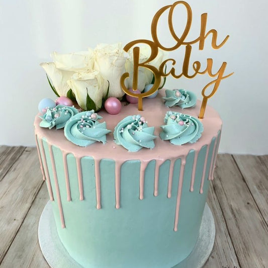 “Our Little Miracle” cake in soft pastels with rainbow touches
