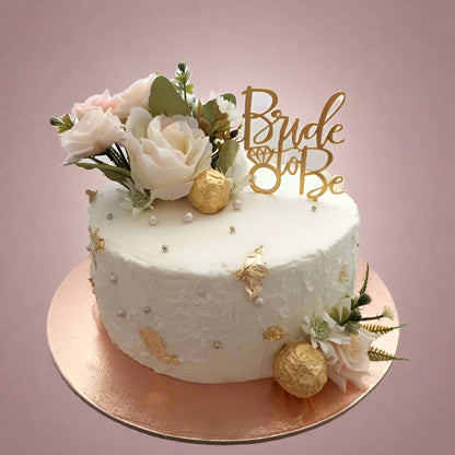 “The Wedding Whisper” cake with soft floral accents and romantic hues