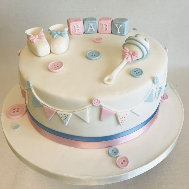 “Tiny Toes & Sweet Joy” cake featuring fondant baby feet