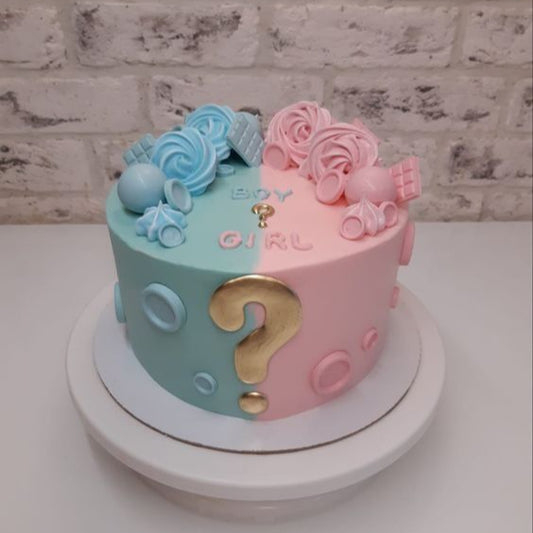 “Welcome to the World” cake with globe and baby accessories