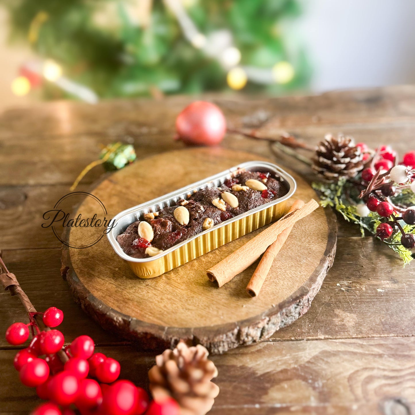 Dessert in a rectangular mold on a wooden board with Christmas decorations
